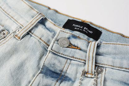Men Streetwear Denim Shorts Light Blue Wash with Black Paint Streak Print and Raw Hem 5048