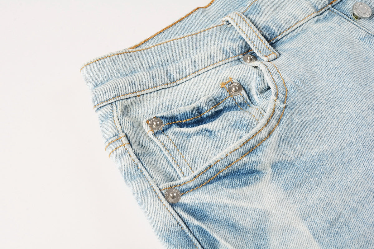 Men Streetwear Denim Shorts Light Blue Wash with White Distressed Patches and Raw Hem 5069