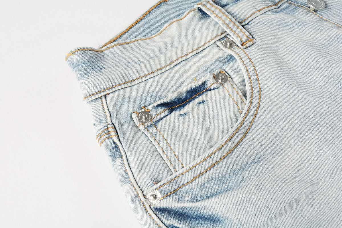 Men Streetwear Denim Shorts Light Blue Wash with Black Paint Streak Print and Raw Hem 5048
